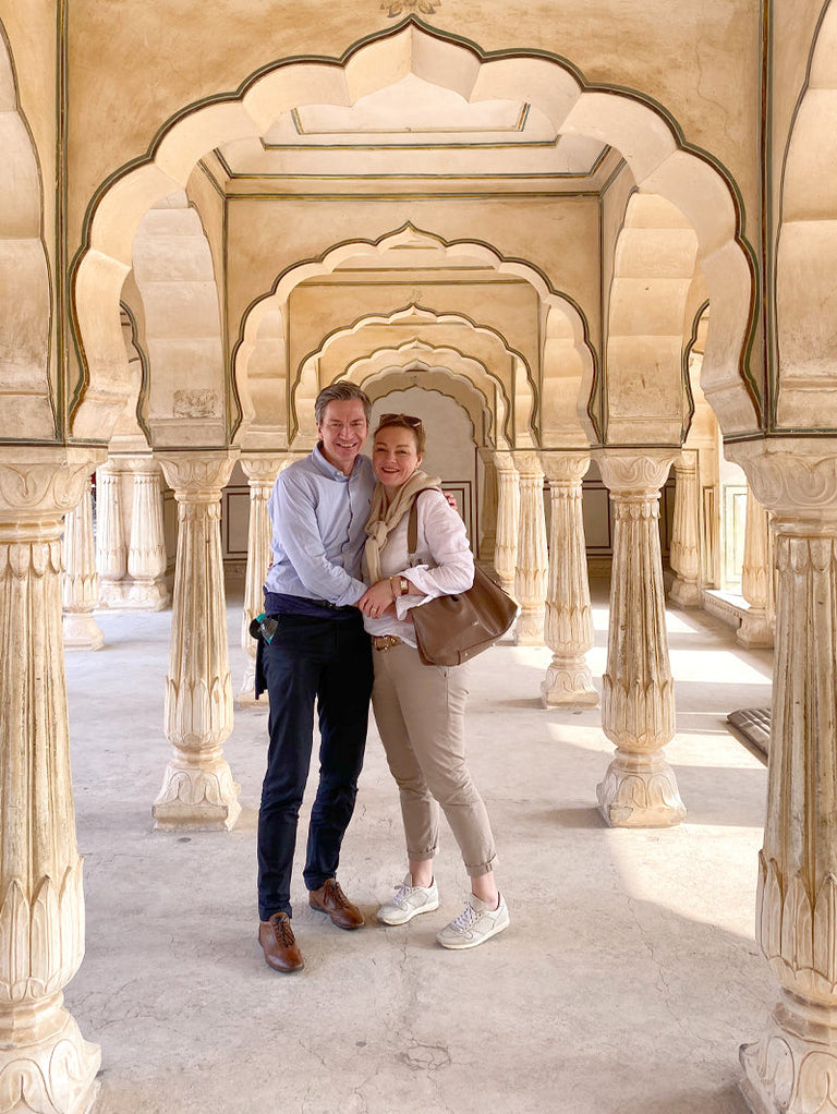 Image of Kay Victoria and the founder in India in front of the Taj Mahal