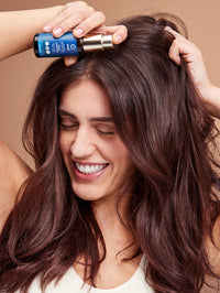 Image of Neem Harmony Hair & Scalp Oil, model with hair by khadi